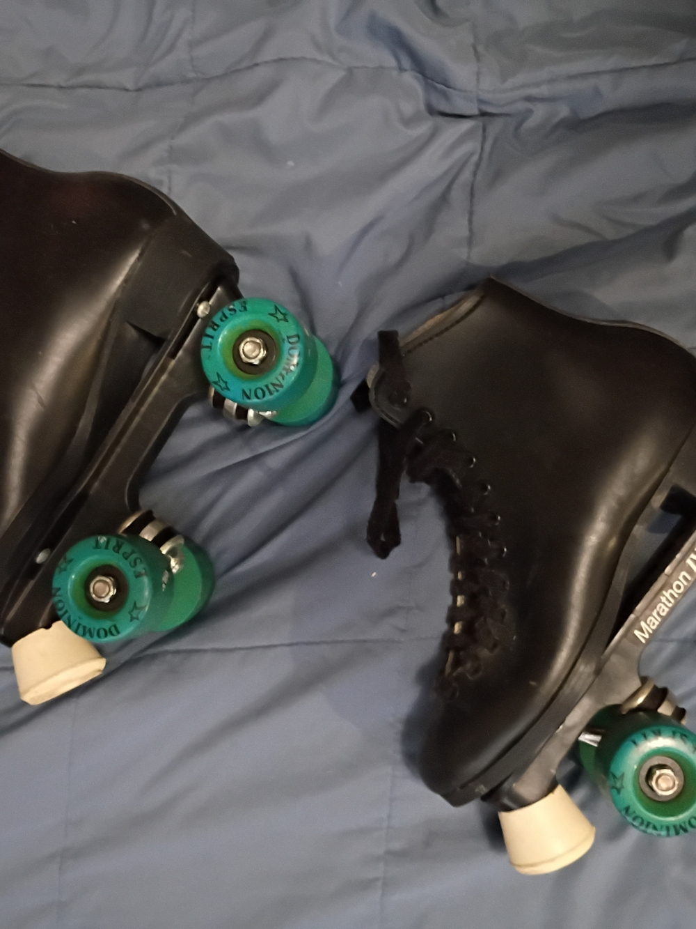 Classic Black Women's Roller Skates with Teal Wheels
